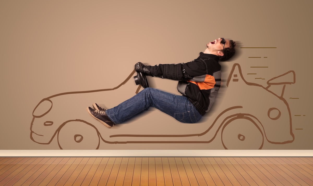 Homme en train de conduire une voiture pour une publicité Marietton